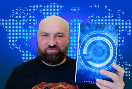 Kris Rivenburgh, Founder of Accessible.org holding his new Published Book.